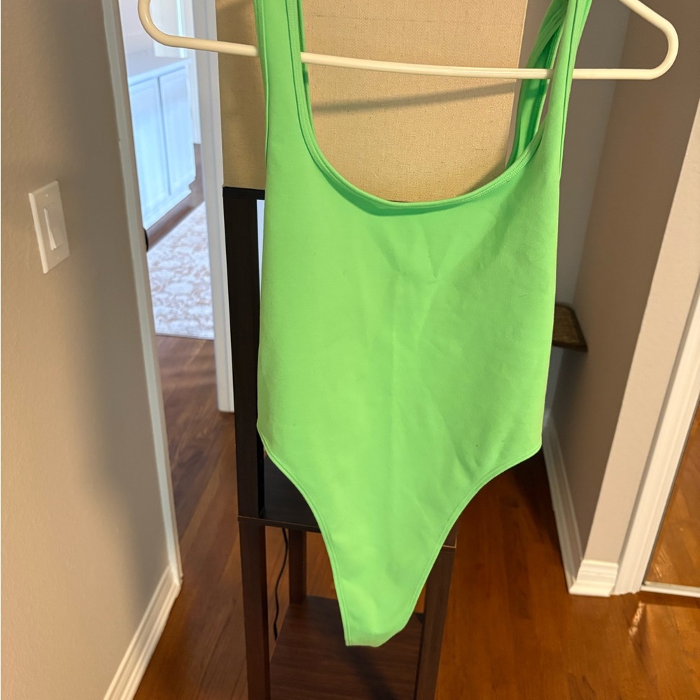 4 different Alo Yoga bodysuits bundled